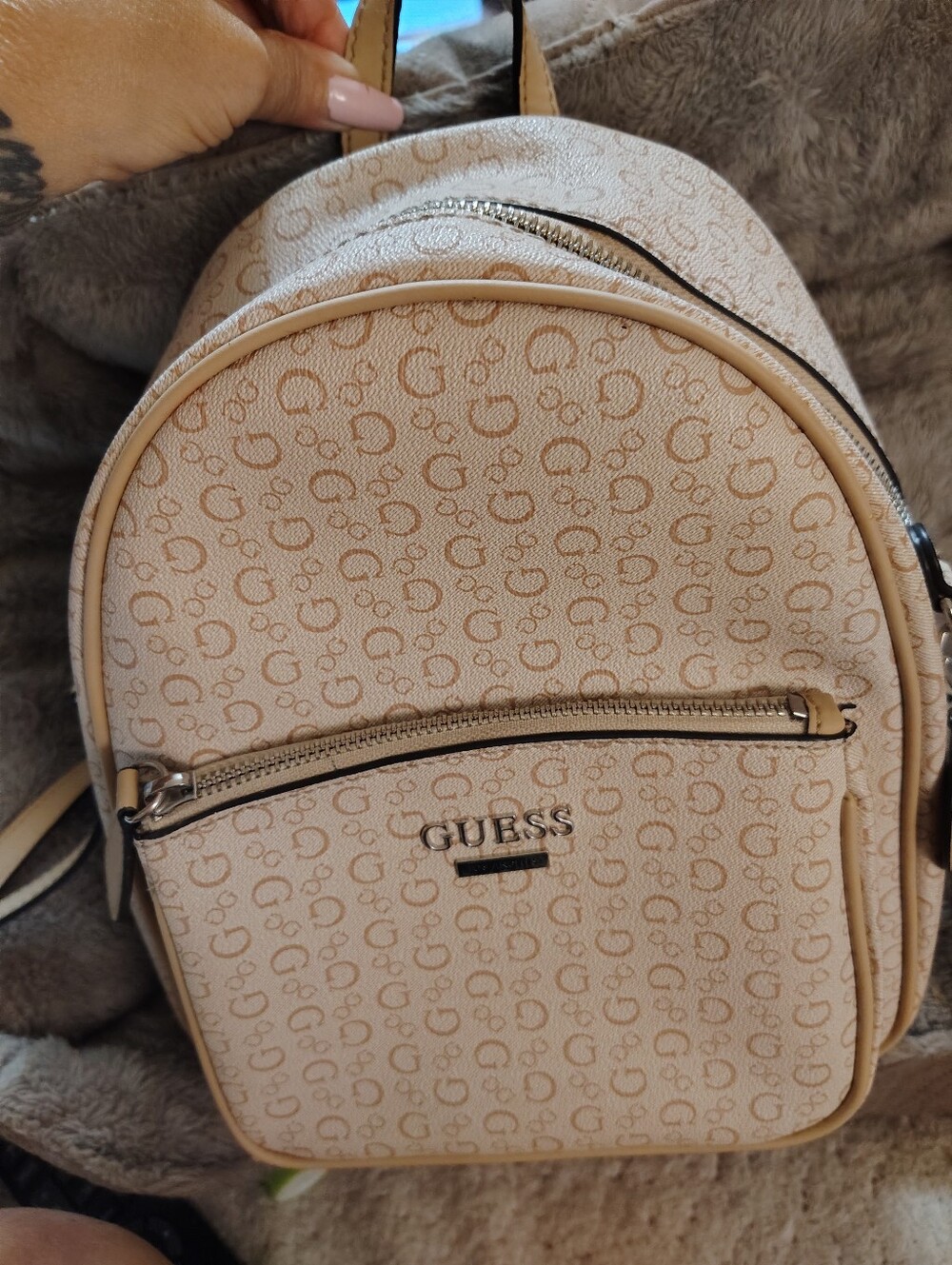 Cute And Trendy. GUESS Beige Logo-Print Mini Backpack with Adjustable Straps.